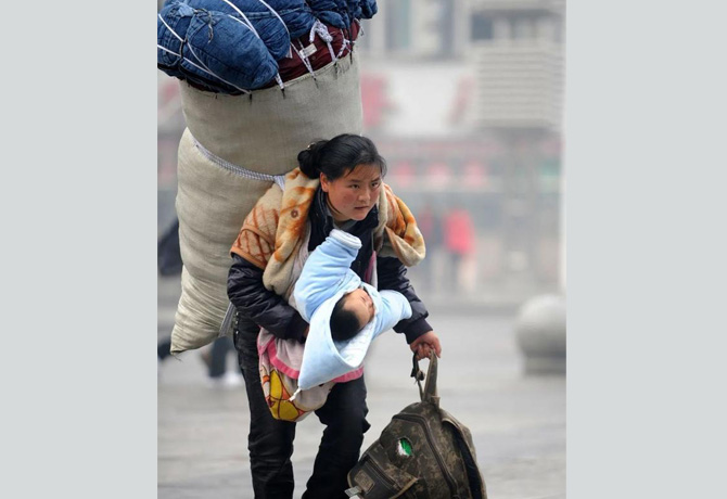 11年前那位感動中國的“春運母親”，找到了！