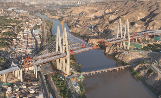 黃河上游首座八車道跨河大橋即將跨越天險實現“牽手”